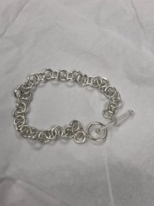 a silver metal bracelet